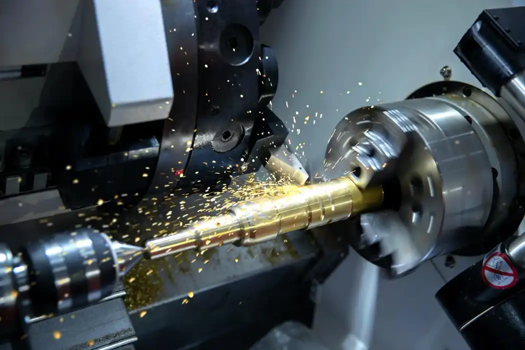 CNC milling machine cutting metal workpiece to produce precision machined components